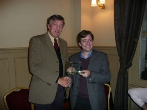 Stephen Fry receiving award